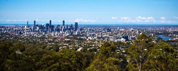 panorama of brisbane cbd as seen from the Mount Coot-tha summit; brisbane downtown in spring 2023 with skyscrapers and brisbane river seen from the mountain, hiking in brisbane
