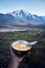 Tourist food noodles against mountains camping