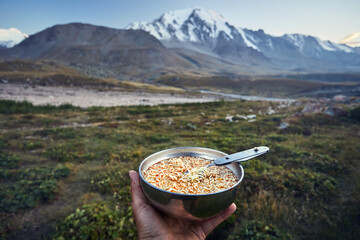 Tourist food noodles against mountains camping