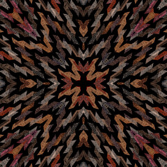 Seamless textured kaleidoscopic pattern. Orange, brown ornament on a black background.