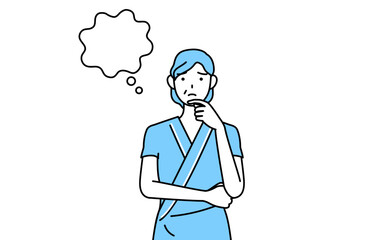 顔をかきながら考える中年・シニア女性入院患者