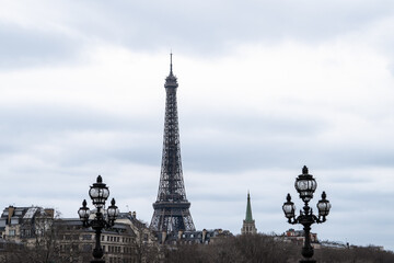 Fototapeta na wymiar Close up view of The Eiffel Tower head from pont alexander III bridge .