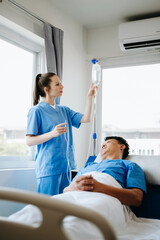 Fototapeta premium Caucasian doctor smiling take care of a young patient in hospital. Friendly nurse or therapeutic treat client Professional medical service concept.