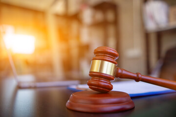 wooden judge gavel on table as symbol of justice for use in legal cases judicial system and civil...