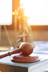 wooden judge gavel on table as symbol of justice for use in legal cases judicial system and civil...