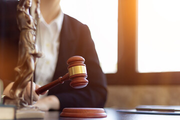 wooden judge gavel on table as symbol of justice for use in legal cases judicial system and civil...
