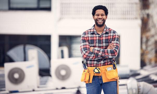 Engineering, portrait and man arms crossed on roof air conditioning, maintenance and technician ac repair. Happy African person, handyman or electrician contractor for aircon or electricity service