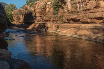 Fototapeta na wymiar Slide Rock area of Oak Creek Canyon creek red rocks and reflection