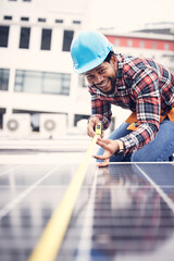 Engineer man, measuring tape or solar panel on rooftop for sustainable planning, renewable energy or development. African technician smile, photovoltaic system or roof installation with measurement