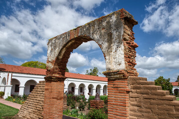 brick arch gate at historic California mission San Luis Rey in Oceanside 