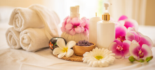 Fototapeta na wymiar The compress ball spa salt cup, and lotion bottle are key components of a relaxing spa treatment.