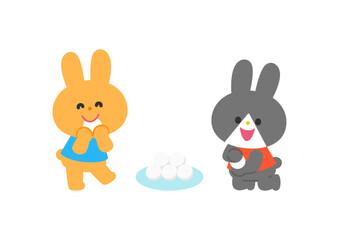 お団子を丸めて食べるウサギたち