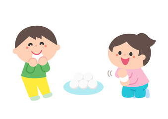 お団子を丸めて食べる子どもたち.