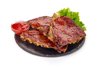 Roasted spicy ribs in a bbq or tomato sauce with herbs, isolated on a white background.