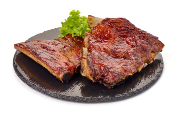Delicious Grilled Ribs with bbq sauce, isolated on a white background. Close-up.