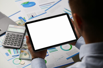 Business analysis and accounting concept and businessman working with spreadsheet document. Using tablet and calculator report analytics and statistics