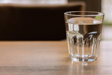 Glass of water on table. Clean water. Thirst concept. Purity background. Cold drinks. Healthy lifestyles. Clean beverage. Healthy nutrition. Freshness concept. 
