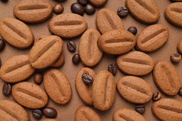 Fototapeta na wymiar Concept of tasty snack for hot drink - cookies in the shape of coffee seeds