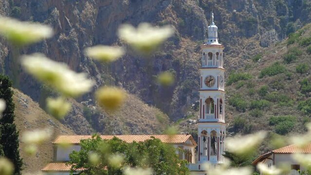 Breathtaking Scenic Of Topolia Church Crete In Distance At Sunny Day In Hania, Greece. blurred foreground