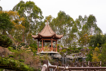 Fototapeta na wymiar Gazebo in a luxurious traditional Chinese garden