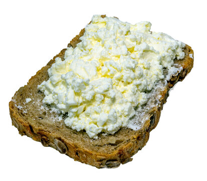 soft cheese sandwich on organic bread on a neutral background