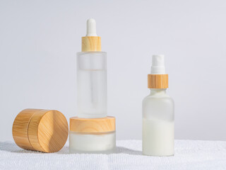 Cosmetics packaging. Set of different cosmetic bottles of cream or serum on a white background. Blank packaging. Natural beauty spa product concept. Beauty.Mock-up