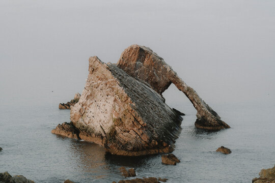 Majestic rock formation in sea, Portknockie, Aberdeenshire, Scotland
