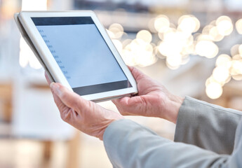 Hands, mockup and typing on tablet screen in office, accounting or research in workplace. Technology, finance and professional person or business woman browsing online, calculator app and fintech.