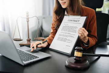 Judge gavel with scales of justice, Business and lawyer or counselor consulting and discussing...