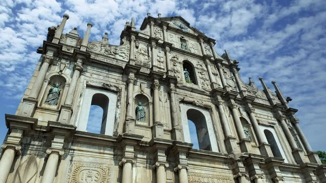 Ruin of St.Paul cathedral time lapse on a sunny day, the travel destination landmark of Macau, China.