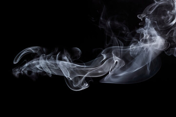 Fototapeta premium Smoke isolated on black background. Abstract white smoke on black background.