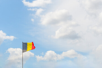 Blue skies and the Belgian flag. horizontal format. copy space