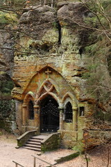 Fototapeta premium Pilgrimage site Praying Mine with a rock chapel, carved into the sandstone rock, Svojkov