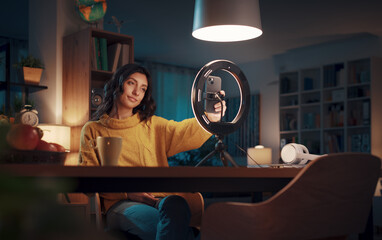 Vlogger recording a video for her followers