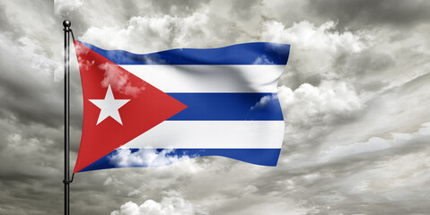 Cuba national flag cloth fabric waving on beautiful sky grey Background.