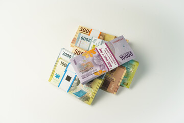 Jakarta, Indonesia, April 15, 2023, various bundles of Indonesian rupiah banknotes in the IDR currency thousands copy space thr zakat