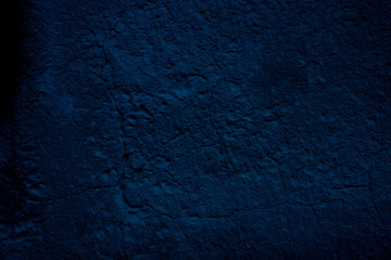 Blue colored abstract wall background with textures of different shades of blue