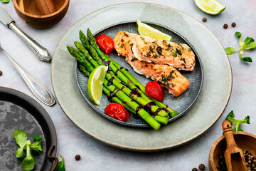 Salmon cooked with asparagus.
