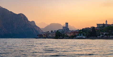 Obraz premium Italy, Lake Garda, Castle of Malcesine during sunrise