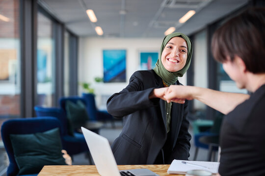 Smiling woman in office