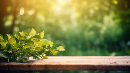 Beautiful spring background with green juicy young foliage and empty wooden table in nature outdoor. Natural template with Beauty bokeh and sunlight, close - up.