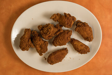 Breaded and fried chicken wings