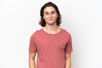 Fototapeta premium Young handsome man isolated on white background laughing
