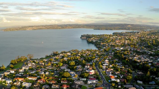 Drone view over a residential area in Howick on a coastline in Auckland, New Zealand