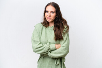 Young caucasian woman isolated on white background making doubts gesture while lifting the shoulders