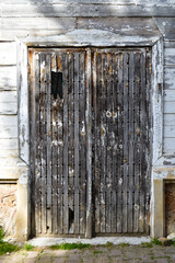 Old brown wooden entrance door of house in Turkey Istanbul Buyukada