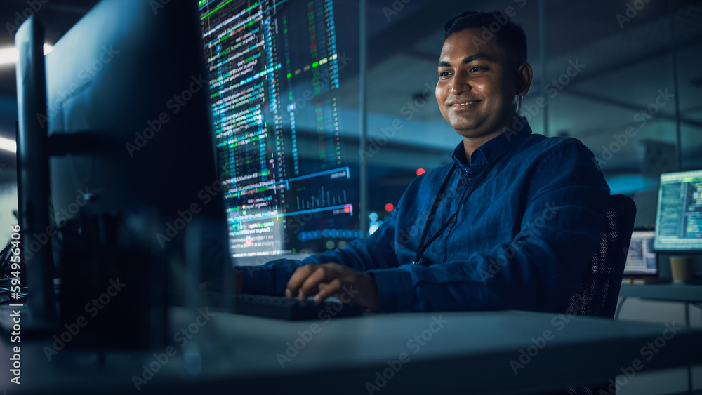 Leinwandbilder Futuristic Office with Hologram Screens: Professional Indian IT Programmer Working on Computer with Holographic Projection Displaying Data and Charts. Asian Specialist Creating Innovative Software.