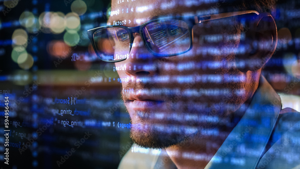 Poster Portrait of Startup Digital Entrepreneur Working on Computer, Line of Code Projected on Face and Reflecting in His Glasses. Developer Working on Innovative e-Commerce App using AI and Big Data
