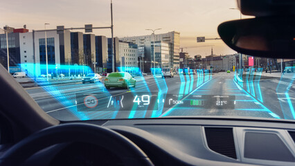Futuristic Autonomous Self-Driving Concept Car Moving Through City, Head-up Display HUD Showing Infographics: Speed, Distance, Navigation, Fuel. Road Scanning. Driver Seat Point of View POV / FPV.