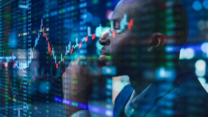 Portrait of Black Stock Market Trader Doing Analysis of Investment Charts, Graphs, Ticker Numbers Projected on His Face. African American Financial Analyst, Entrepreneur Successfully Trading
